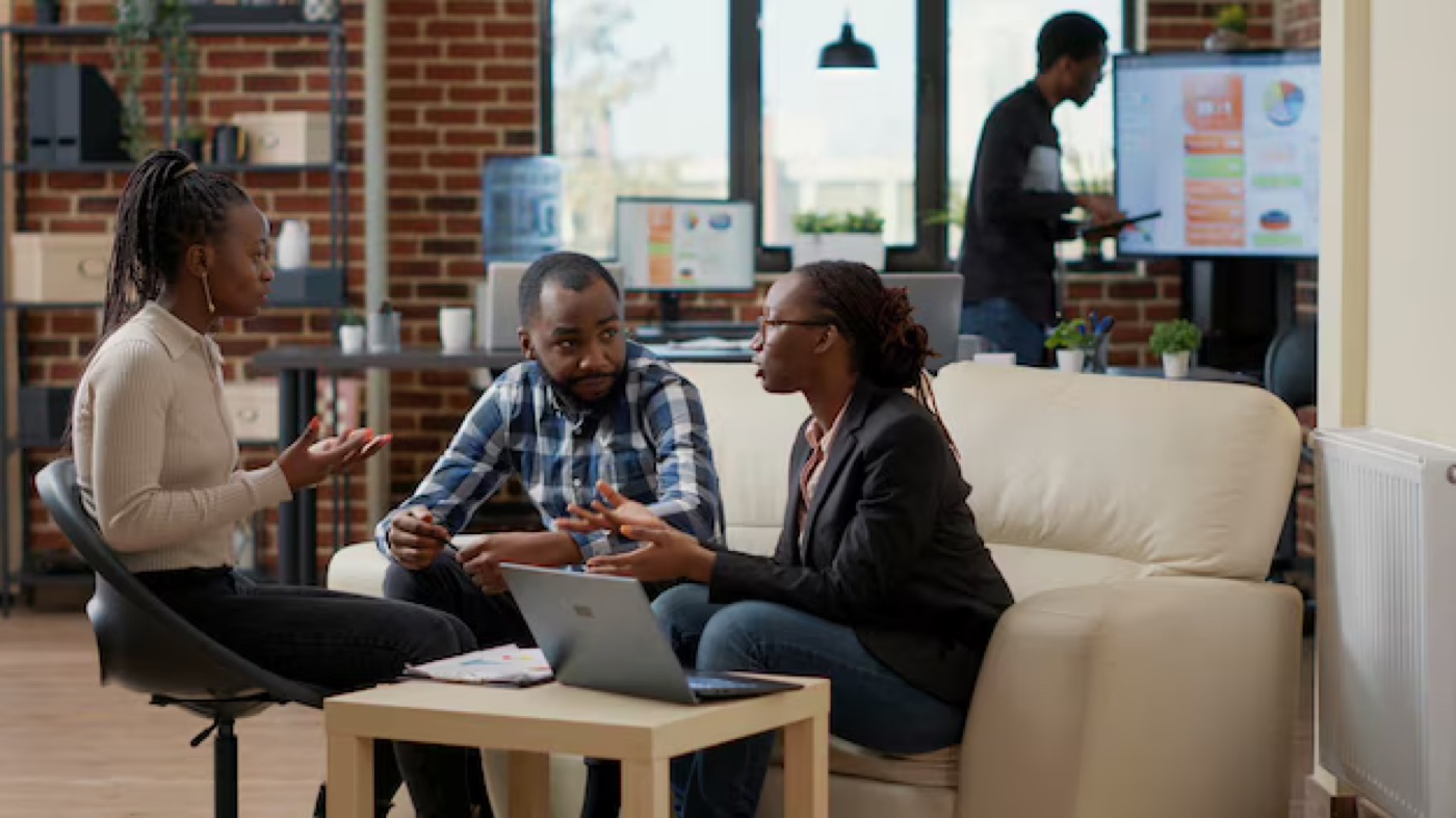 Enterprise team collaborating in a relaxed workspace